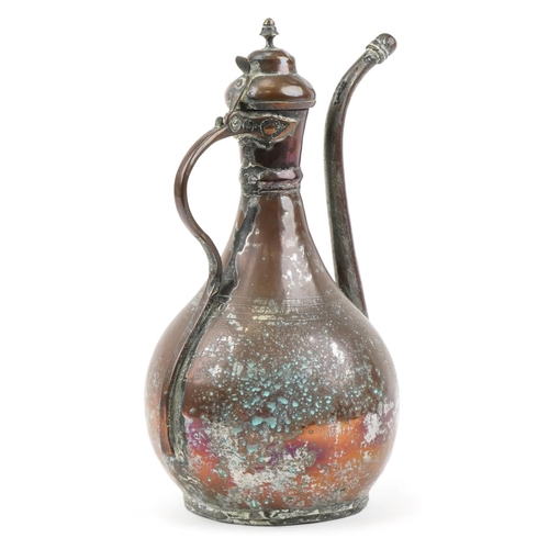 233 - Large middle eastern copper coffee pot, 37cms tall