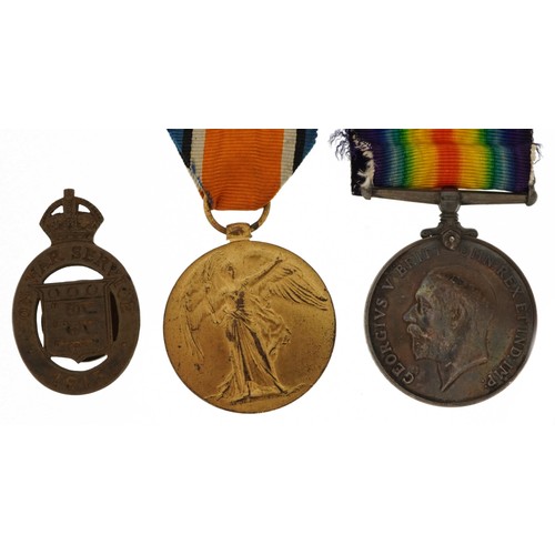 1228 - British military World War I pair with On War Service lapel and mirror with identification card, the... 