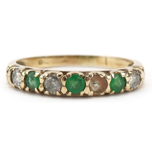 3193 - 9ct gold diamond, emerald and clear stone half eternity ring, size M, 1.6g