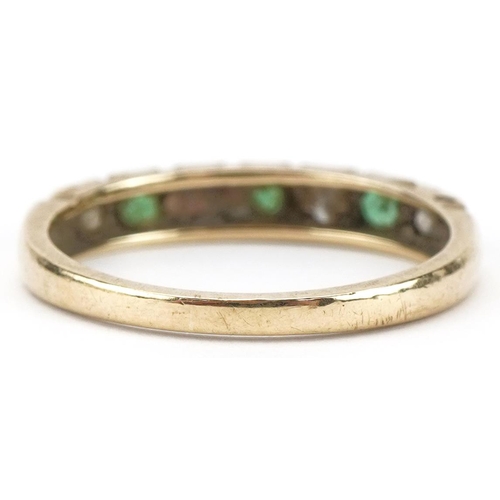 3193 - 9ct gold diamond, emerald and clear stone half eternity ring, size M, 1.6g