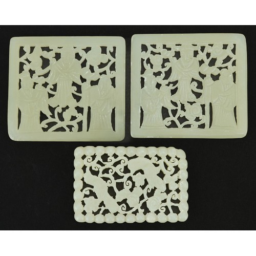 205 - Three Chinese green jade panels carved with three figures, 7.2cm wide