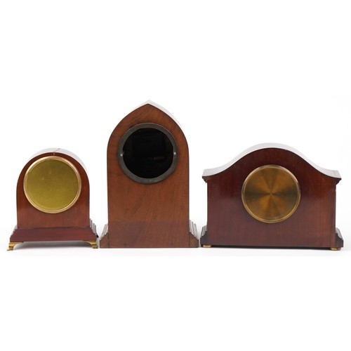 8 - Three Edwardian inlaid mahogany mantle clocks with enamelled dials, the largest 26cm high