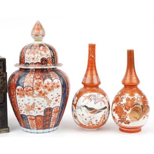 210 - Japanese ceramics and woodenware including an Imari vase, Imari plate, Satsuma vases and a wooden ta... 