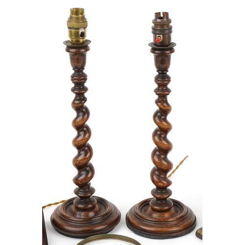 179 - Pair of oak barley twist candlesticks, cast iron letter stamps, magnifying glasses, brass pen tray, ... 