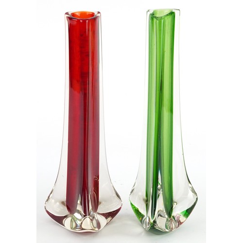 303 - Two triangular art glass vases, each 24cm high