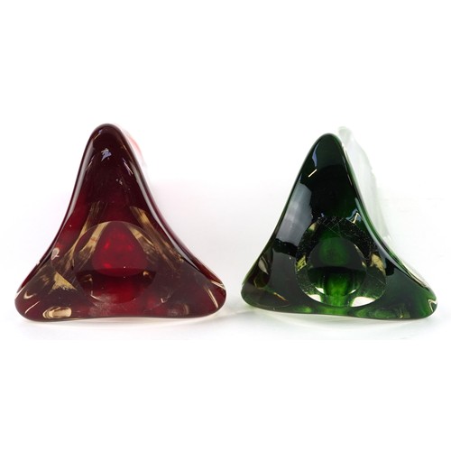 303 - Two triangular art glass vases, each 24cm high