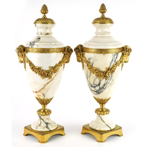 171 - Pair of French calacatta marble and ormolu urn design garnitures with ram's head mounts, 45cm high