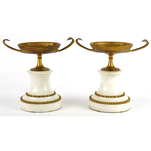 272 - Pair of French white marble and gilt metal garnitures, 21cm high