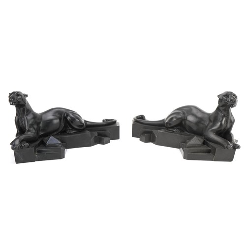 508 - After P. Trudeau, pair of Art Deco style bronzed pumas, 34cm wide