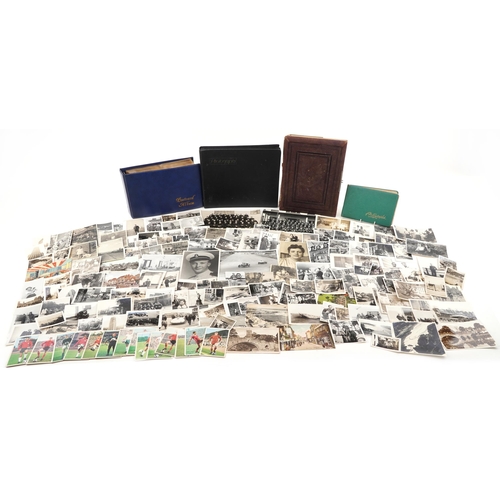 774 - Assorted photographs including Victorian cabinet cards, autograph book, postcards and silk cigarette... 