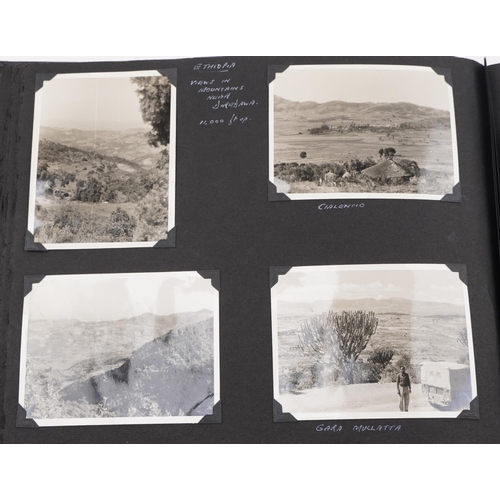 774 - Assorted photographs including Victorian cabinet cards, autograph book, postcards and silk cigarette... 