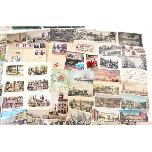 829 - Assorted ephemera including miniature children's books, postcards and Historic Cars coin set