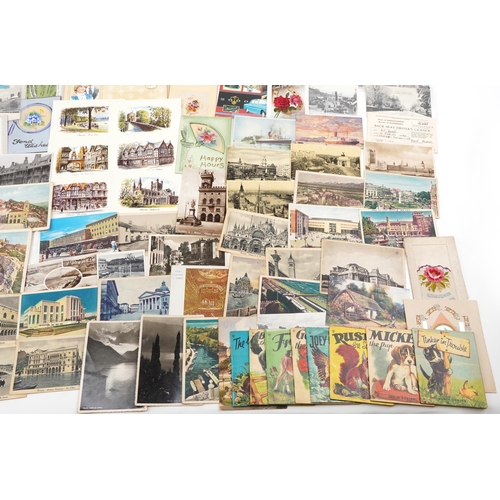 829 - Assorted ephemera including miniature children's books, postcards and Historic Cars coin set