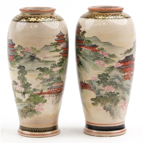 200 - Pair of Japanese Satsuma pottery vases finely decorated with landscapes, character mark to the base,... 