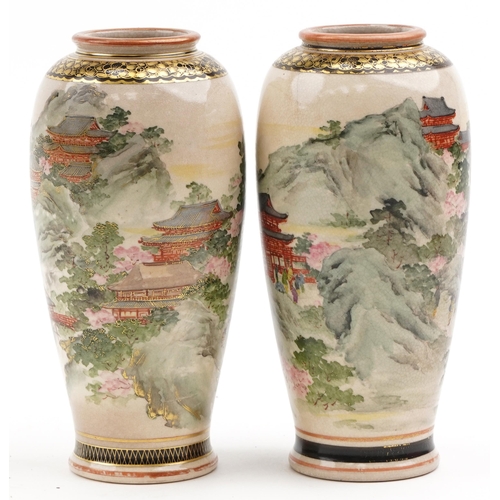 200 - Pair of Japanese Satsuma pottery vases finely decorated with landscapes, character mark to the base,... 