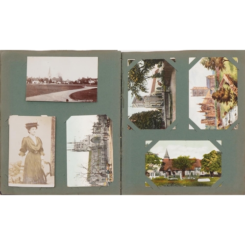 783 - Topographical and social history postcards arranged in an album including locomotives, turbine steam... 