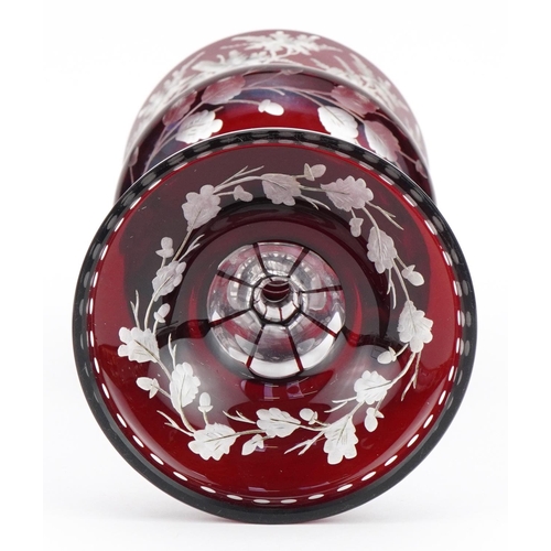 518 - 19th century Bohemian ruby overlaid glass goblet and cover etched with wild animals amongst foliage,... 