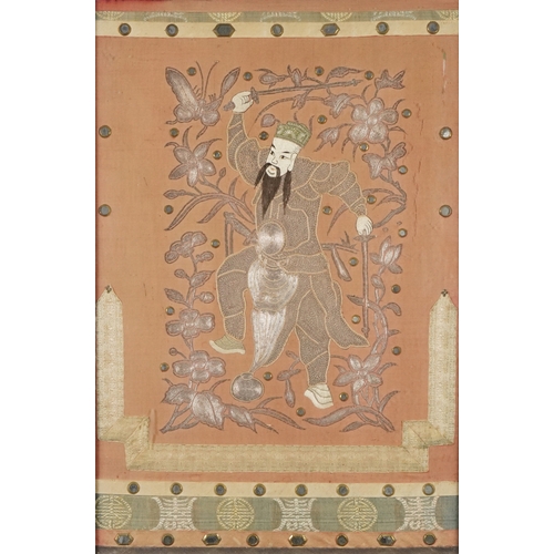 458A - Oriental silkwork picture of a warrior housed in a mahogany frame with handle, 83x53cms including fr... 