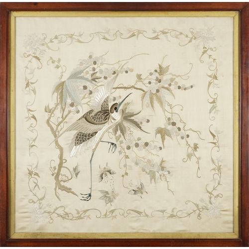 461A - Oriental silkwork picture of an exotic bird, insects, flowers and berries housed in a mahogany frame... 