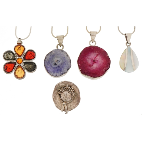 3828 - Four silver and white metal semi precious stone pendants on chains and a silver hat brooch, total we... 