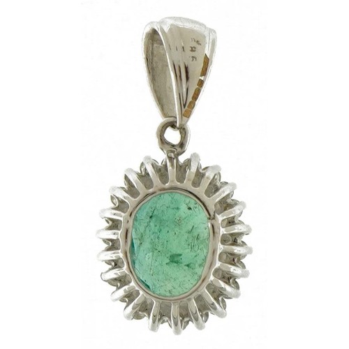 3205 - 14ct white gold emerald and diamond pendant, total emerald weight approximately 0.88 carat, total di... 