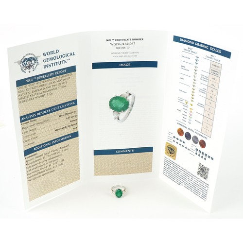 3200 - 18ct white gold oval emerald and diamond ring, total emerald weight approximately 4.45 carat, total ... 