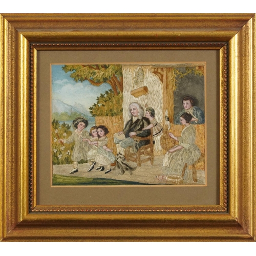 304 - Antique silk work picture hand painted and worked with a family playing before a landscape, mounted ... 