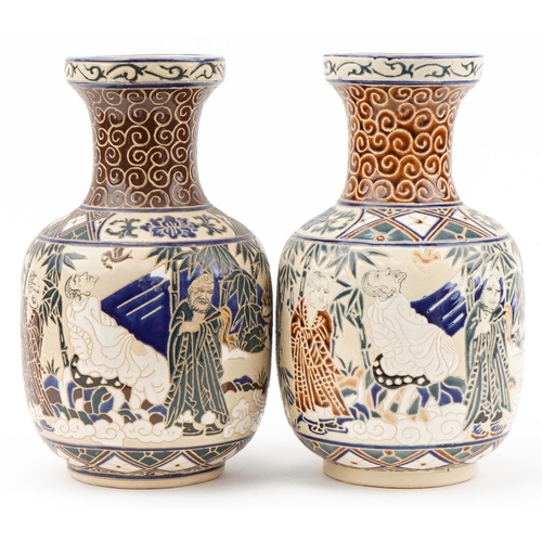 533 - Pair of Chinese porcelain vases hand painted with scholars in landscapes, each 35cm high