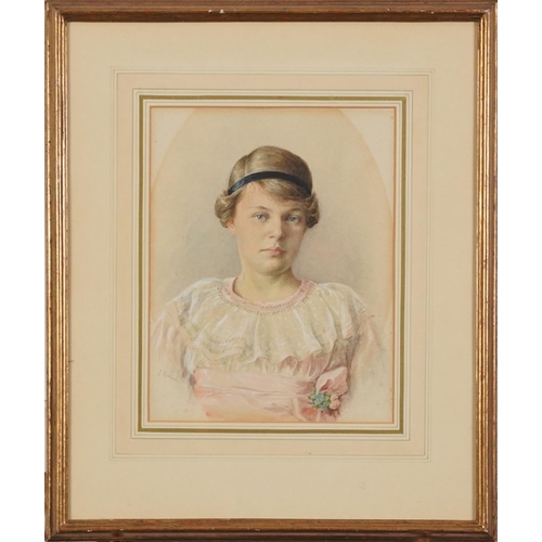 50 - L Ruckgaber - Early 20th century head and shoulders portrait of a young female, signed watercolour, ... 