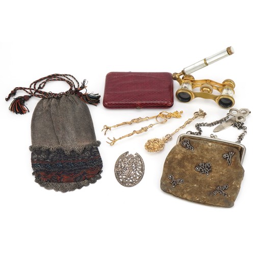 Georgian and later objects including a leather coin purse with applied floral steel mounts, mother of pearl opera glasses gilded with flowers, tooled leather card case and early 19th century steel miser's purse, the largest 11cm wide