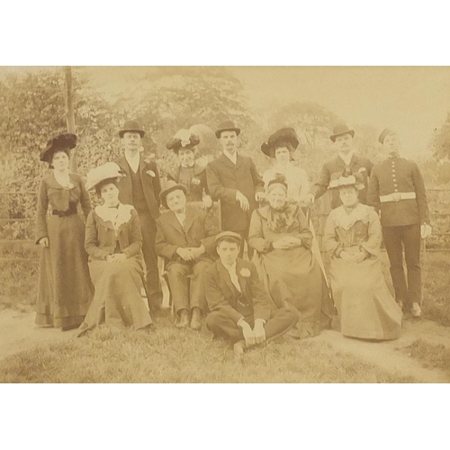 915 - Two Victorian black and white social history photographs including one of a family, mounted, framed ... 