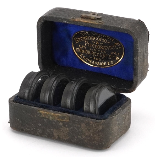 1363A - Boxed set of Stereoscopic Photographic Company lenses, 106 and 108 Regent Street, each 3cm in diamet... 