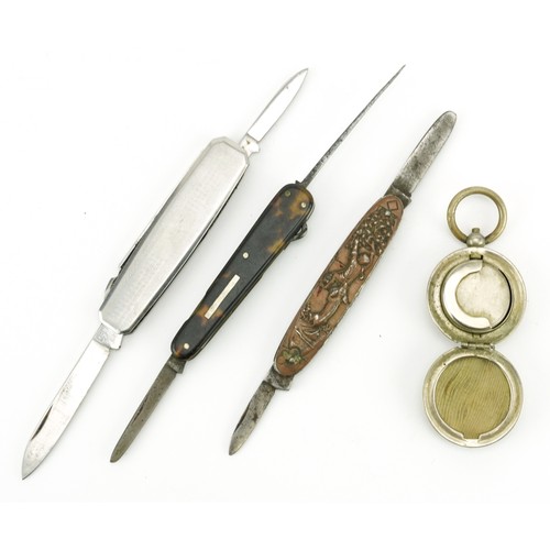 1419 - Metal sovereign case and three penknives including one with a boy poking a dog up a tree and being c... 