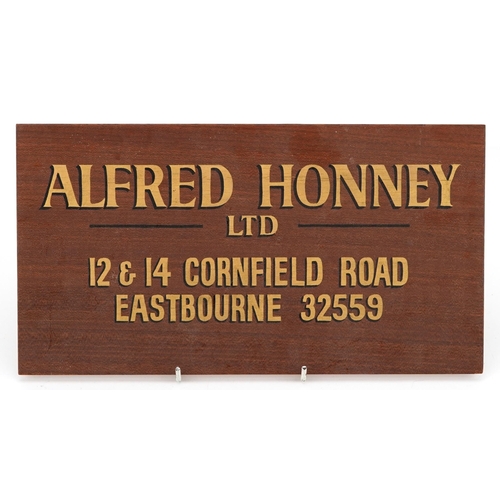 1476 - Vintage mahogany and gilt letter advertising sign for Alfred Honney Limited, 12 & 14 Cornfield Road,... 