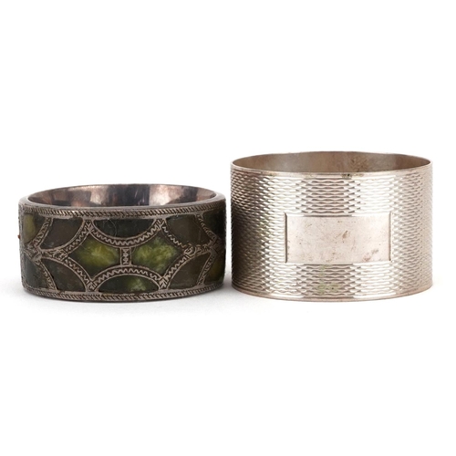 1598 - Silver green hardstone napkin ring together with an engine turned example, H Bros Birmingham 1969, 4... 