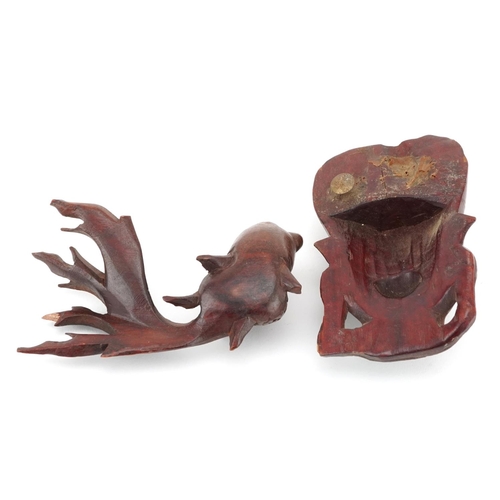 1436 - Japanese carved wooden Koi carp with beaded glass eyes together with a carved wooden face mask, the ... 