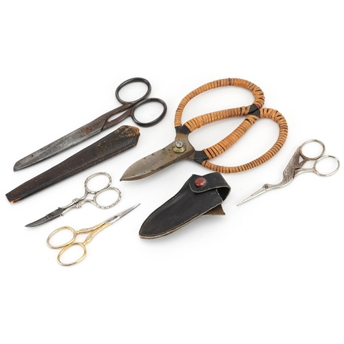 1448 - Two pairs of vintage cased scissors, pair of stork design scissors and a pair of nail scissors, the ... 