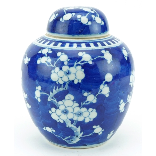 1762 - Oriental Chinese blue and white ginger jar and cover hand painted with the prunus pattern, 22cm high