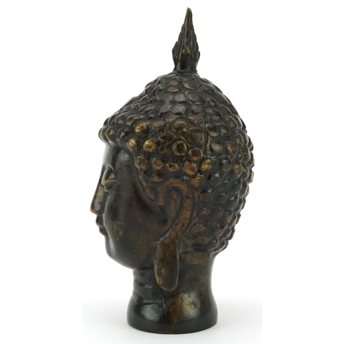 1461 - Tibetan patinated bronze Buddha head, 15cm high