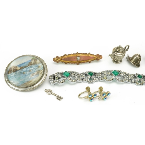 2594 - Antique and later jewellery including a circular brooch hand painted with a coastal scene, Art Deco ... 