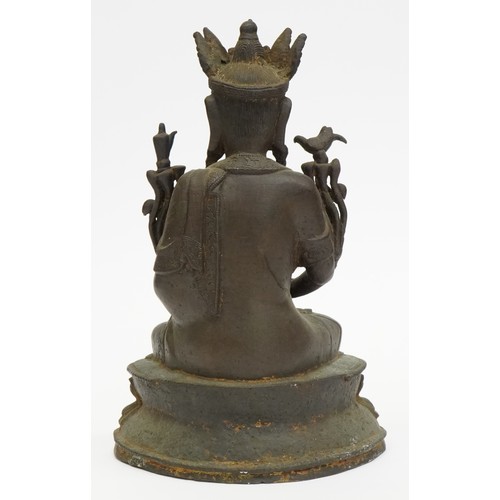 11 - 18th Century Chino Tibetan bronze buddha, 20cms tall