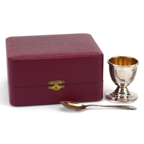 242 - Henry Clifford Davis, Elizabeth II silver christening eggcup and spoon with fitted case, Birmingham ... 