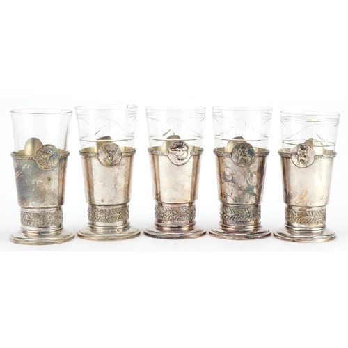 524 - Five French  hunting interest cut glasses with silver plated holders cast with animal heads, each im... 