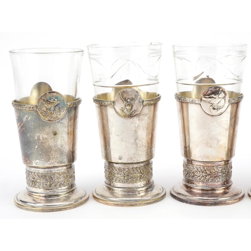 524 - Five French  hunting interest cut glasses with silver plated holders cast with animal heads, each im... 