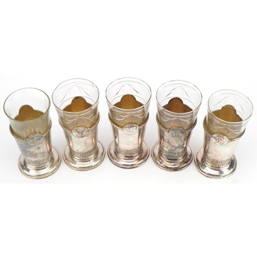 524 - Five French  hunting interest cut glasses with silver plated holders cast with animal heads, each im... 