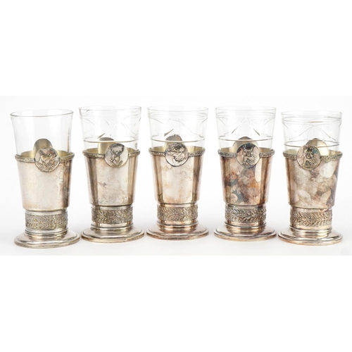 524 - Five French  hunting interest cut glasses with silver plated holders cast with animal heads, each im... 