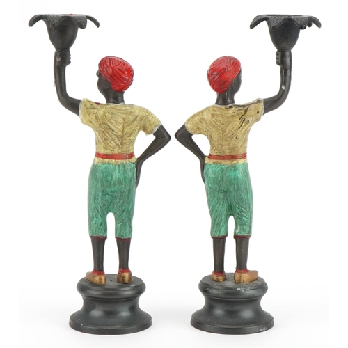 400 - After Franz Xaver Bergmann, pair of Austrian style cold painted bronzed blackamoor candlesticks, eac... 