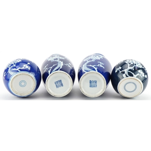 1394 - Chinese blue and white prunus pattern porcelain including a pair of baluster vases and two ginger ja... 