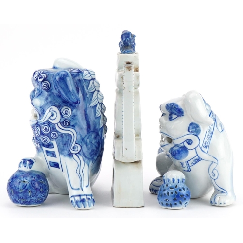 1532 - Chinese blue and white porcelain comprising two qilins and a teapot, the largest 25cm high