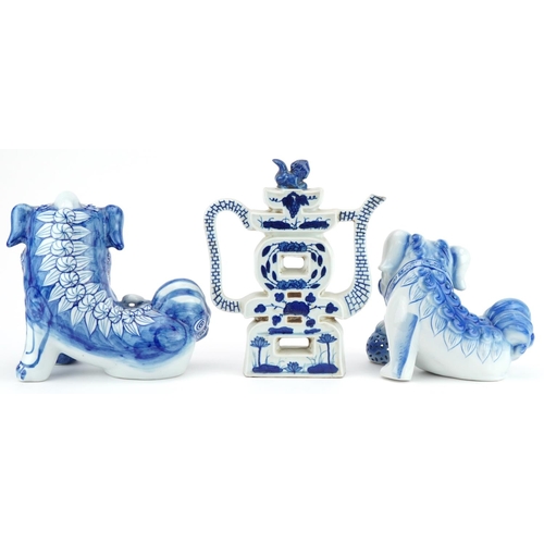 1532 - Chinese blue and white porcelain comprising two qilins and a teapot, the largest 25cm high